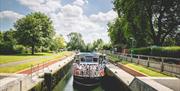 Caversham Princess with passengers onboard in Mapledurham Lock