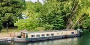 Whittington Tea Barge moored on the Thames in Reading
