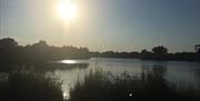 Dinton Pastures lake at sunset