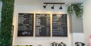 Blackboard menus on wall