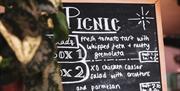 Picnic written on a black board