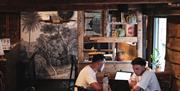 Two men working at a table
