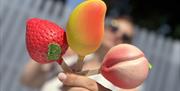 Fruit-shaped gelato on sticks
