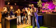 Group playing crazy golf