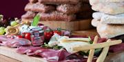 platter of meat, cheese and bread