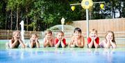 Children at water play park
