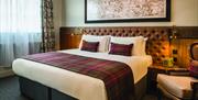 The photo shows a Mansion House bedroom.