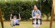 children on swings