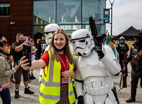 Lady posing with storm trooper at Cine Valley in Reading