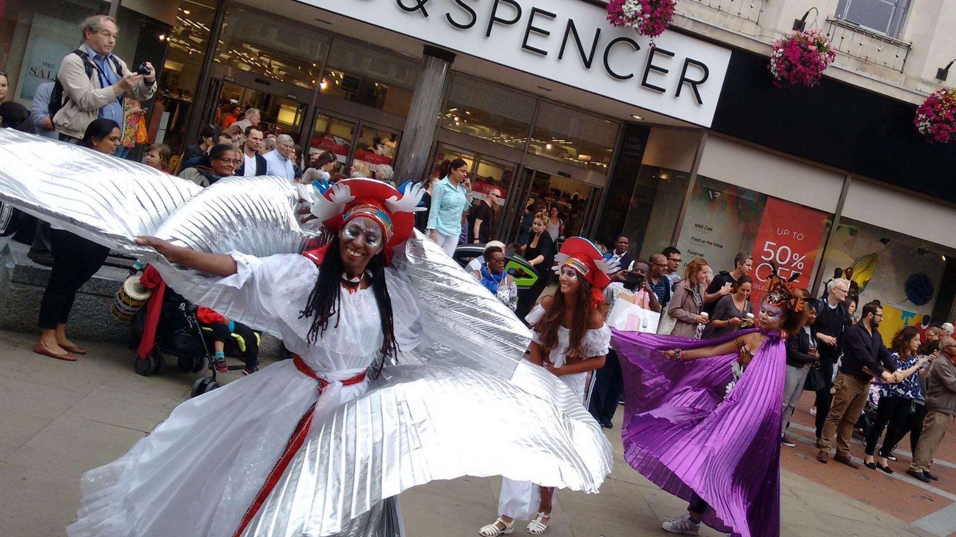 Carnival of the World festival showing black female dancer on Broad Street in Reading.