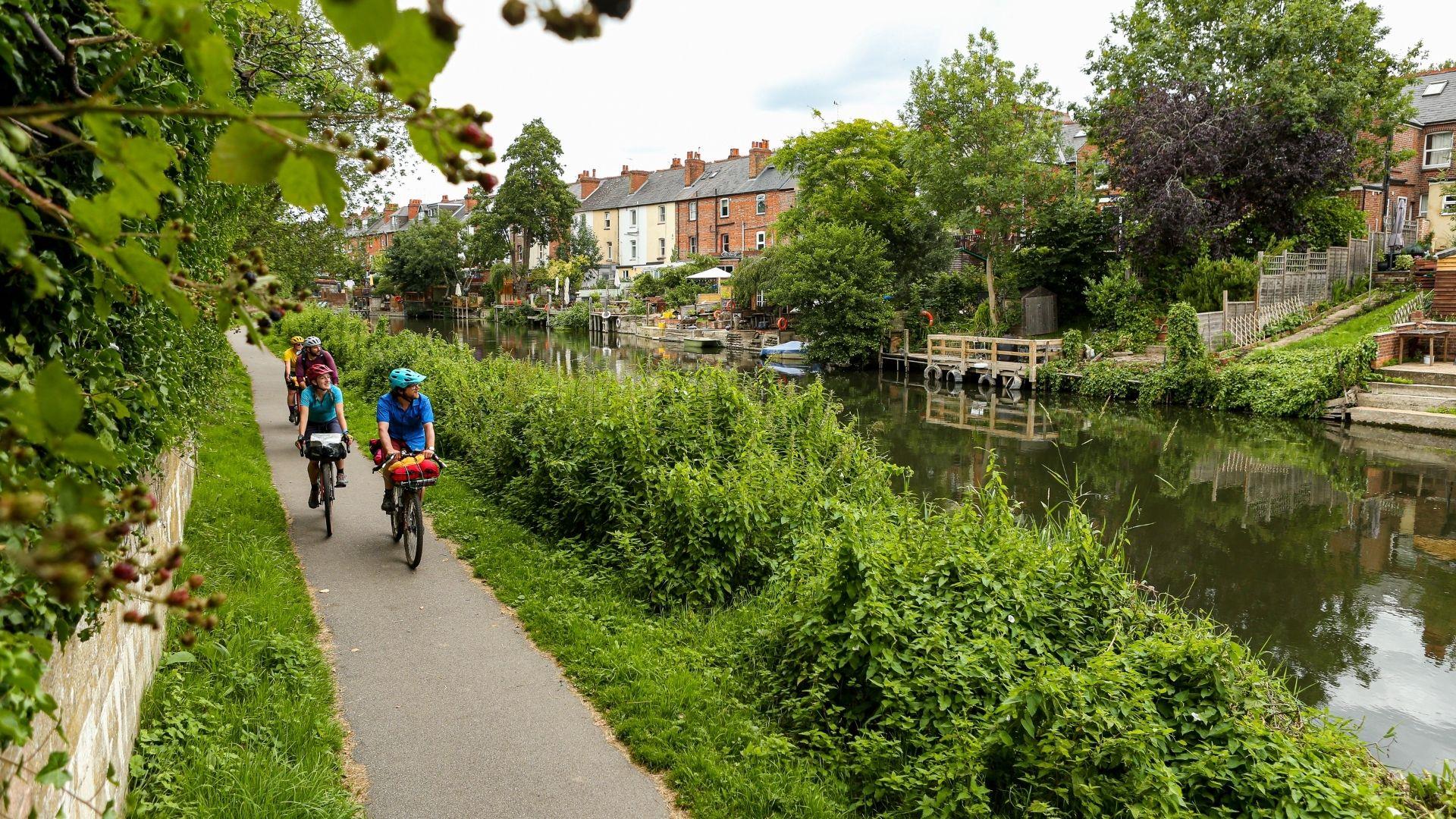 group of cyclists alongside the Kennet & Avon Canal
