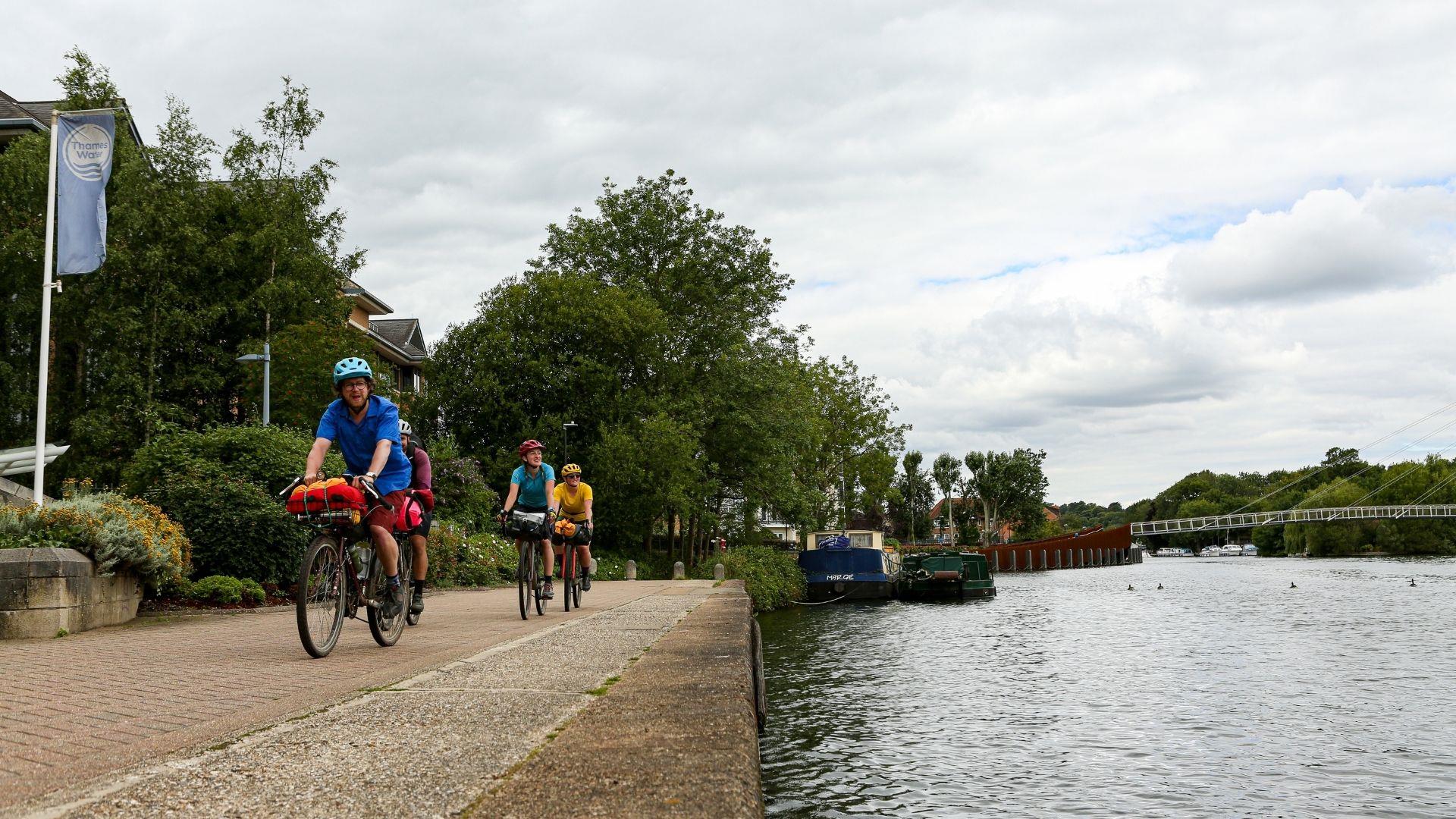 cycling group alongside the Thames in Reading