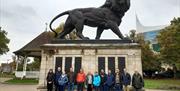 Company/Corporate Team Building Walkabout in front of The Maiwand Lion sculpture & War memorial in the Forbury Gardens, Reading Town Centre