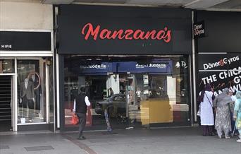 front of Manzano's