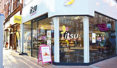 glass front of Itsu