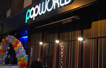 balloon arch outside Popworld