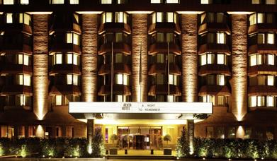 Facade of Penta Hotel at night