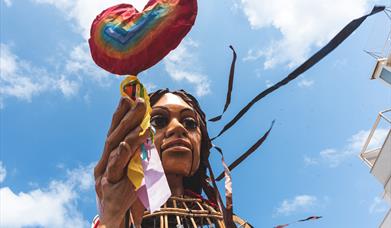 Close-up of Amal's face.