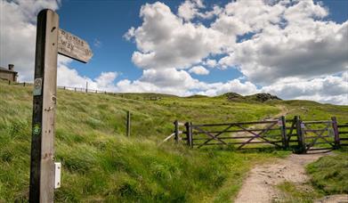 Signpost and gate on the Pennine Bridleway.