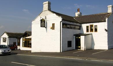 Exterior of the White House pub.