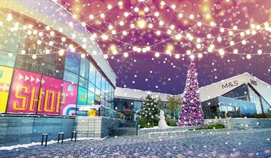 Rochdale Riverside lit up with Christmas lights.