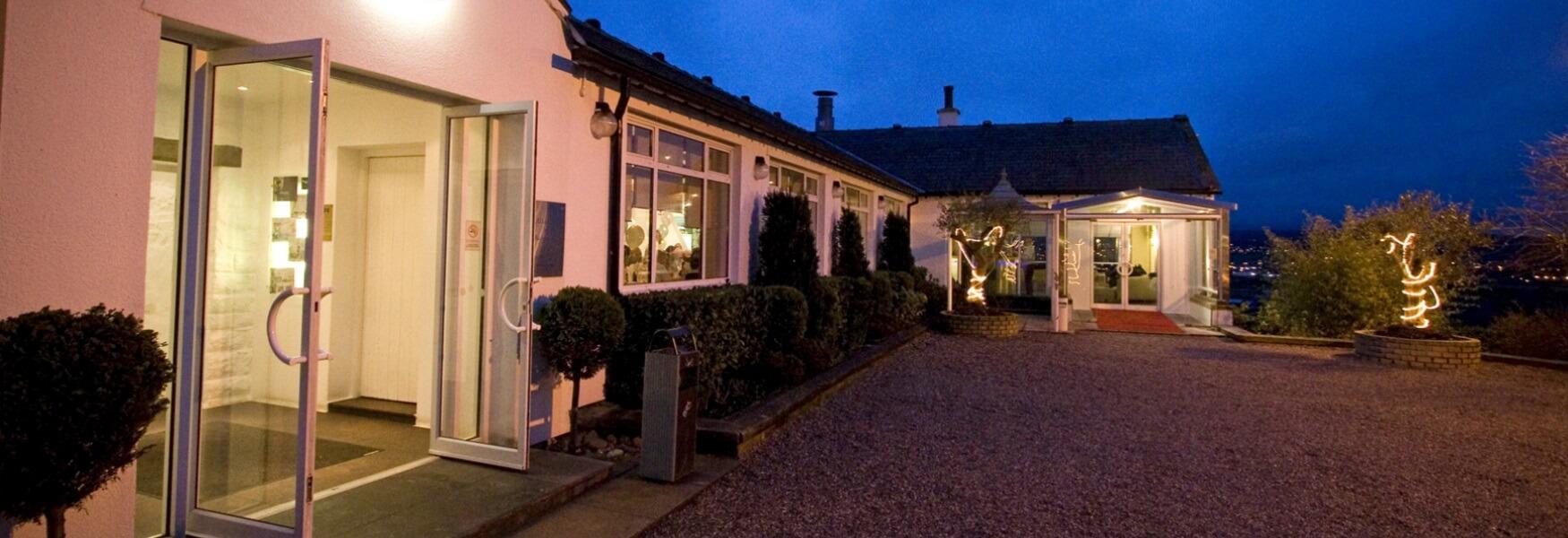 The exterior of the Bellavista restaurant at night.