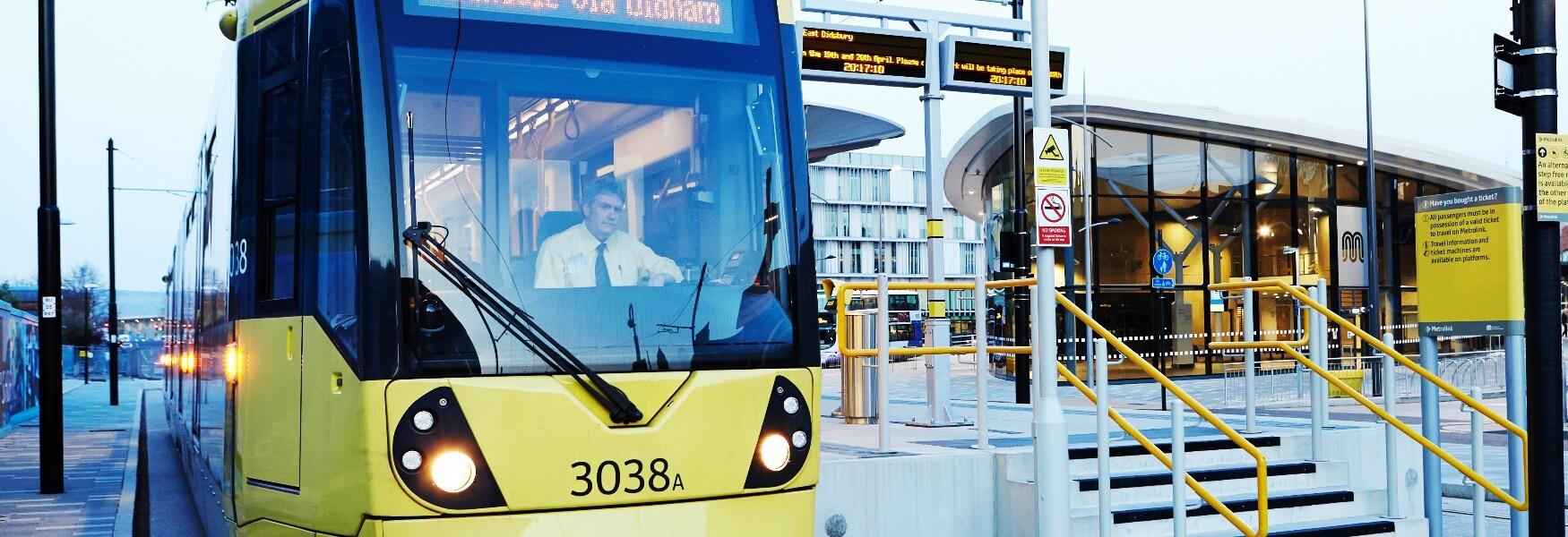 A Metrolink tram in front of Rochdale Interchange.