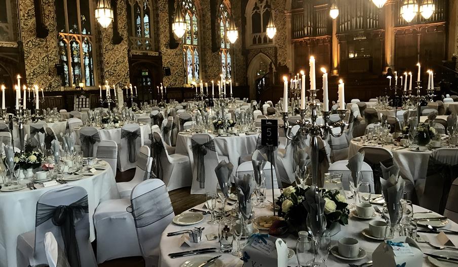 The Great Hall at Rochdale Town Hall, with dining tables set for a special event.
