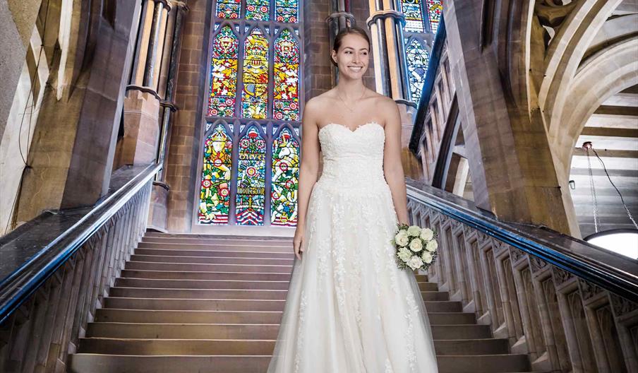 Bride standing on Grand Staircase in Rochdale Town Hall.