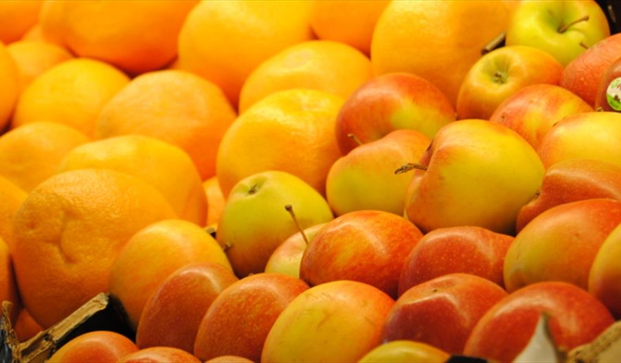 Boxed apples and oranges.