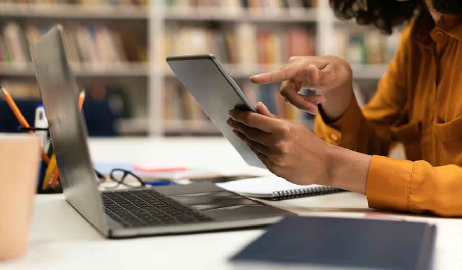 Woman using a digital tablet.