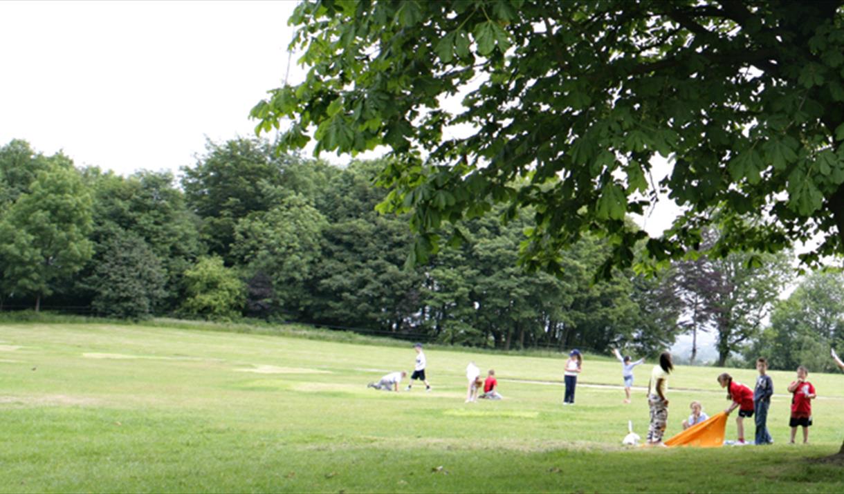 Families playing at Falinge Park.