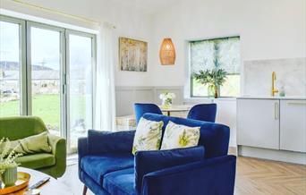 Lounge area with sofa and table.