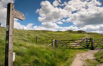 Signpost and gate on the Pennine Bridleway.