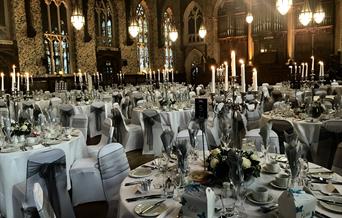 The Great Hall at Rochdale Town Hall, with dining tables set for a special event.