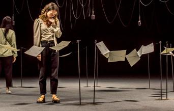 An art installation of microphones and cables.