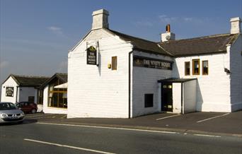 Exterior of the White House pub.