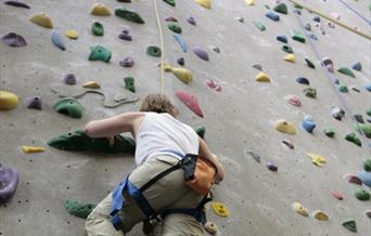 Individual Climbing on Indoor Climbing Wall