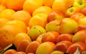 Boxed apples and oranges.