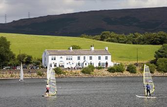Hollingworth Lake Country Park with pub and windsurfers