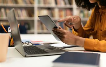 Woman using a digital tablet.