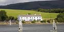 Hollingworth Lake Country Park with pub and windsurfers