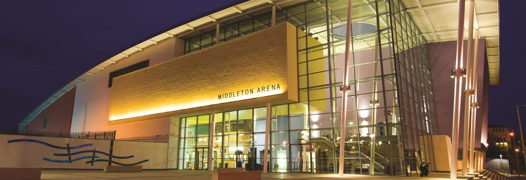 Exterior of Middleton Arena at night.