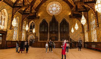Visitors examining the Great Hall at Rochdale Town Hall.