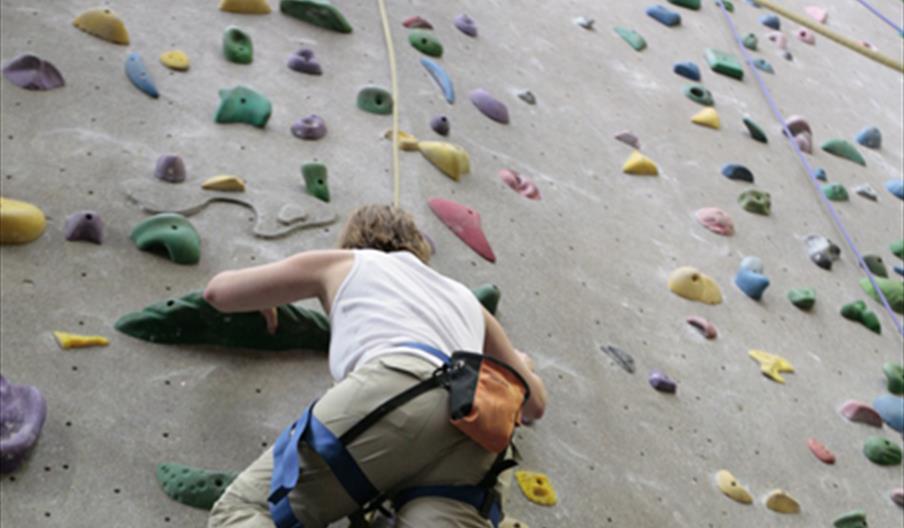 Individual Climbing on Indoor Climbing Wall