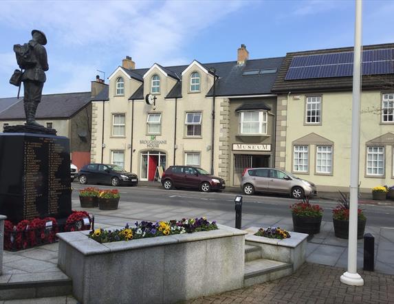 Museum from main street with statue.