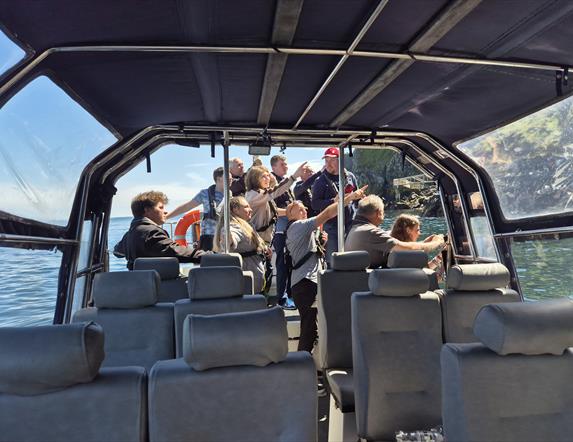 Group of visitors enjoying scenery on Charter Boats NI