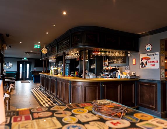 Rustic wooden panelled bar