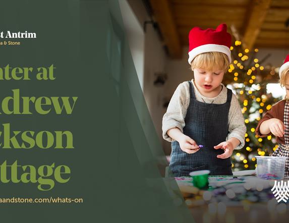Two children making christmas decorations