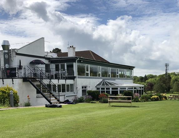 Cairndhu Golf Club ClubHouse - rear view with restaurant windows facing onto golf course.